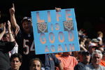 CHICAGO - OCTOBER 8:  A happy Bears fans cheers during a game between the Chicago Bears and the Buffalo Bills at Soldier Field on October 8, 2006 in Chicago, Illinois.  The Bears won 40-7.  (Photo by Jonathan Daniel/Getty Images)