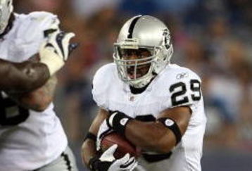 NASHVILLE, TN - AUGUST 15: Michael Bush #29 of the Oakland Raiders runs with the ball during the NFL pre-season game against the Tennessee Titans at LP Field August 15, 2008 in Nashville, Tennessee.  (Photo by Andy Lyons/Getty Images)