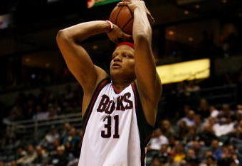 MILWAUKEE - FEBRUARY 09: Charlie Villanueva #31 of the Milwaukee Bucks puts up a shot against the Houston Rockets on February 9, 2009 at the Bradley Center in Milwaukee, Wisconsin. The Bucks defeated the Rockets 124-112. NOTE TO USER: User expressly acknowledges and agreees that, by downloading and/or using this Photograph, User is consenting to the terms and conditions of the Getty Images License Agreement. (Photo by Jonathan Daniel/Getty Images)