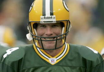 GREEN BAY, WI - JANUARY 1: Brett Favre #4 of the Green Bay Packers smiles during warm-ups prior to the start of a game against the Seattle Seahawks January 1, 2006 at Lambeau Field in Green Bay, Wisconsin.  (Photo by Jonathan Daniel/Getty Images)
