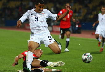 RUSTENBURG, SOUTH AFRICA - JUNE 21:  Charlie Davies of USA battles with Mohamed Aboutrika of Egypt during the FIFA Confederations Cup match between Egypt and USA at Royal Bafokeng Stadium on June 21, 2009 in Rustenburg, South Africa.  (Photo by Jamie McDonald/Getty Images)