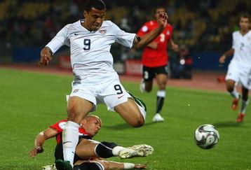RUSTENBURG, SOUTH AFRICA - JUNE 21:  Charlie Davies of USA battles with Mohamed Aboutrika of Egypt during the FIFA Confederations Cup match between Egypt and USA at Royal Bafokeng Stadium on June 21, 2009 in Rustenburg, South Africa.  (Photo by Jamie McDonald/Getty Images)