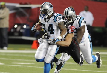 ATLANTA - NOVEMBER 23: Running back DeAngelo Williams #34 of the Carolina Panthers rushes upfield against the Atlanta Falcons at the Georgia Dome on November 23, 2008 in Atlanta, Georgia.  (Photo by Al Messerschmidt/Getty Images)