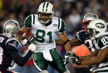 FOXBORO, MA - NOVEMBER 13:  Dustin Keller #81 of the New York Jets weaves past Jason Webster #23 of the New England Patriots on November 13, 2008 at Gillette Stadium in Foxboro, Massachusetts.  (Photo by Elsa/Getty Images)