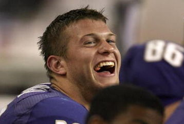 SEATTLE - SEPTEMBER 13:  Quarterback Jake Locker #10 of the Washington Huskies laughs from the bench during the game against the Oklahoma Sooners on September 13, 2008 at Husky Stadium in Seattle, Washington. The Sooners defeated the Huskies 55-14.(Photo by Otto Greule Jr/Getty Images) 