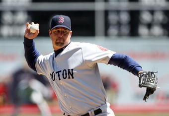 OAKLAND, CA - APRIL 15: Tim Wakefield #49 of the Boston Red Sox pitches against the Oakland Athletics during a Major League Baseball game on April 15, 2009 at the Oakland Coliseum in Oakland, California.  (Photo by Jed Jacobsohn/Getty Images)