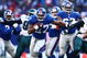 EAST RUTHERFORD, NJ -  JANUARY 11:  Brandon Jacobs #27 of the New York Giants runs the ball against the Philadelphia Eagles during the NFC Divisional Playoff Game on January 11, 2009 at Giants Stadium in East Rutherford, New Jersey.  The Eagles defeated the Giants 23 -11. (Photo by Chris McGrath/Getty Images)