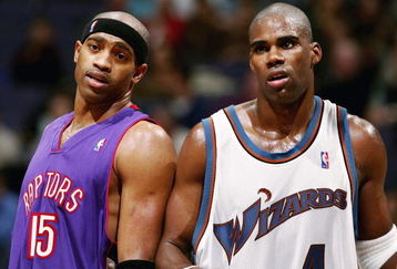 WAHINGTON DC - NOVEMBER 23:  Antawn Jamison #4 of the Washington Wizards and Vince Carter #15 of the Toronoto Raptors talk during a free throw as the Wizards defeated the Raptors 102-86 November 23, 2004 at the MCI Center in Washington D.C.  NOTE TO USER:  User expressly acknowledges and agrees that, by downloading and or using this photograph, User is consenting to the terms and conditions of the Getty Images License Agreement.  (Photo by Doug Pensinger/Getty Images)