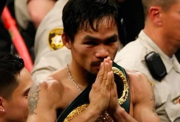 LAS VEGAS - MAY 02:  Manny Pacquiao of the Philippines celebrates after knocking out Ricky Hatton of England in the second round during their junior welterweight title fight at the MGM Grand Garden Arena May 2, 2009 in Las Vegas, Nevada.  (Photo by Ethan Miller/Getty Images)