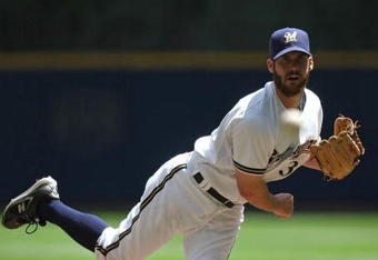 MILWAUKEE - MAY 14: Starting pitcher Dave Bush #31 of the Milwaukee Brewers delivers the ball against the Florida Marlins on May 14, 2009 at Miller Park in Milwaukee, Wisconsin. The Brewers defeated the Marlins 5-3. (Photo by Jonathan Daniel/Getty Images)