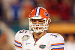MIAMI - JANUARY 08:  Tim Tebow #15 of the Florida Gators looks to the sidelines against the Oklahoma Sooners during the FedEx BCS National Championship Game at Dolphin Stadium on January 8, 2009 in Miami, Florida.  (Photo by Eliot J. Schechter/Getty Images