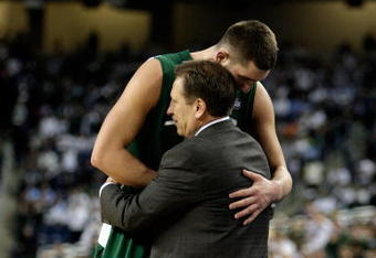 DETROIT - APRIL 06:  Goran Suton #14 of the Michigan State Spartans hugs head coach Tom Izzo after Suton came out of the game late in the second half against the North Carolina Tar Heels during the 2009 NCAA Division I Men's Basketball National Championship game at Ford Field on April 6, 2009 in Detroit, Michigan. North Carolina (Photo by Andy Lyons/Getty Images)