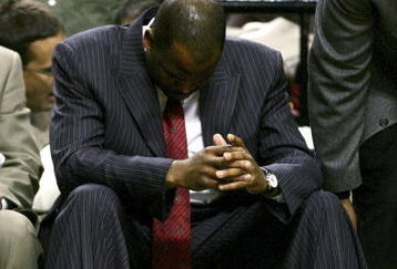 PORTLAND, OR - JANUARY 03:   Head coach Nate McMillan of the Portland Trail Blazers hangs his head during a 99-81 loss to the New York Knicks on January 3, 2007 at the Rose Garden in Portland, Oregon.  NOTE TO USER: User expressly acknowledges and agrees that, by downloading and or using this Photograph, user is consenting to the terms and conditions of the Getty Images License Agreement.   (Photo by Jonathan Ferrey/Getty Images)