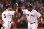 BOSTON - JUNE 11:  David Ortiz #34 of the Boston Red Sox hits a home run and celebrates with teammate Rocco Baldelli against the New York Yankees at Fenway Park on June 11, 2009 in Boston, Massachusetts.  (Photo by Jim Rogash/Getty Images)