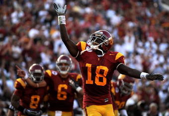 PASADENA, CA - JANUARY 01:  Damian Williams #18 of the USC Trojans celebrates a touchdown at the end of the first half against the Penn State Nittany Lions during the 95th Rose Bowl Game presented by Citi on January 1, 2009 at the Rose Bowl in Pasadena, California.  (Photo by Harry How/Getty Images)