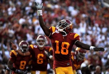 PASADENA, CA - JANUARY 01:  Damian Williams #18 of the USC Trojans celebrates a touchdown at the end of the first half against the Penn State Nittany Lions during the 95th Rose Bowl Game presented by Citi on January 1, 2009 at the Rose Bowl in Pasadena, California.  (Photo by Harry How/Getty Images)