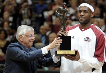 CLEVELAND - MAY 05:  LeBron James #23 of the Cleveland Cavaliers receives 2008-2009 MVP trophy from NBA Commissioner David Stern prior to playing the Atlanta Hawks in Game One of the Eastern Conference Semifinals during the 2009 NBA Playoffs at Quicken Loans Arena on May 5, 2009 in Cleveland, Ohio.  NOTE TO USER: User expressly acknowledges and agrees that, by downloading and or using this photograph, User is consenting to the terms and conditions of the Getty Images License Agreement.  (Photo by Gregory Shamus/Getty Images)