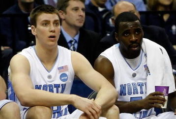 MEMPHIS, TN - MARCH 29:  Tyler Hansbrough #50 and Ty Lawson #5 of the North Carolina Tar Heels sit on the bench in the first half while taking on the Oklahoma Sooners during the NCAA Men's Basketball Tournament South Regional Final at the FedExForum on March 29, 2009 in Memphis, Tennessee.  (Photo by Joe Murphy/Getty Images)