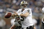 DETROIT - DECEMBER 21: Quarterback Drew Brees #9 of the New Orleans Saints drops back to pass in the third quarter against the Detroit Lions on December 21, 2008 at Ford Field in Detroit, Michigan. The Saints defeated the Lions 42-7.  (Photo by Leon Halip/Getty Images)