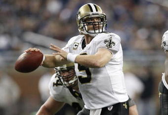 DETROIT - DECEMBER 21: Quarterback Drew Brees #9 of the New Orleans Saints drops back to pass in the third quarter against the Detroit Lions on December 21, 2008 at Ford Field in Detroit, Michigan. The Saints defeated the Lions 42-7.  (Photo by Leon Halip/Getty Images)