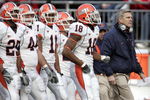 COLUMBUS - NOVEMBER 10:  Head coach Ron Zook (R) of the Illinois Fighting Illini walks with players on the sideline during the first quarter against the Ohio State Buckeyes at Ohio Stadium November 10, 2007 in Columbus, Ohio. Illinois defeated Ohio State 28-21.  (Photo by David Maxwell/Getty Images)