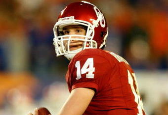 MIAMI - JANUARY 08:  Sam Bradford #14 of the Oklahoma Sooners look to pass against the Florida Gators during the FedEx BCS National Championship game at Dolphin Stadium on January 8, 2009 in Miami, Florida.  (Photo by Marc Serota/Getty Images)