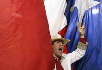 HOUSTON - NOVEMBER 17: A Houston Cougars cheerleader yells during the game against the Marshall Thundering Herd at Robertson Stadium November 17, 2007 in Houston, Texas. Houston won 35-28. (Photo by Stephen Dunn/Getty Images)