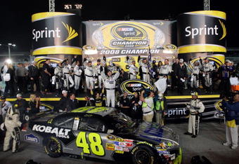 HOMESTEAD, FL - NOVEMBER 16:  Jimmie Johnson, driver of the #48 Lowe's/Kobalt Tools Chevrolet, celebrates with his crew members after winning the 2008 NASCAR Sprint Cup Series Championship after the Ford 400 at Homestead-Miami Speedway on November 16, 2008 in Homestead, Florida.  (Photo by John Harrelson/Getty Images for NASCAR)