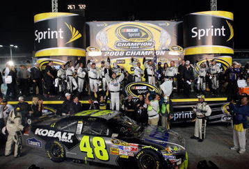 HOMESTEAD, FL - NOVEMBER 16:  Jimmie Johnson, driver of the #48 Lowe's/Kobalt Tools Chevrolet, celebrates with his crew members after winning the 2008 NASCAR Sprint Cup Series Championship after the Ford 400 at Homestead-Miami Speedway on November 16, 2008 in Homestead, Florida.  (Photo by John Harrelson/Getty Images for NASCAR)