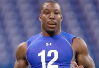 INDIANAPOLIS, IN - FEBRUARY 24:  Defensive back Vontae Davis of Illinois runs the 40 yard dash during the NFL Scouting Combine presented by Under Armour at Lucas Oil Stadium on February 24, 2009 in Indianapolis, Indiana. (Photo by Scott Boehm/Getty Images)