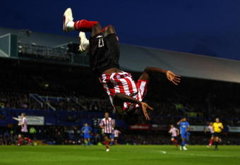 PORTSMOUTH, UNITED KINGDOM - MAY 18:  Kenwyne Jones of Sunderland celebrates scoring the first goal of the game during the Barclays Premier League match between Portsmouth and Sunderland at Fratton Park on May 18, 2009 in Portsmouth, England.  (Photo by Bryn Lennon/Getty Images)