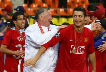 MOSCOW - MAY 21:  Manchester United manager Sir Alex Ferguson (C) smiles with Cristiano Ronaldo of Manchester United after the UEFA Champions League Final match between Manchester United and Chelsea at the Luzhniki Stadium on May 21, 2008 in Moscow, Russia.  (Photo by Alex Livesey/Getty Images)