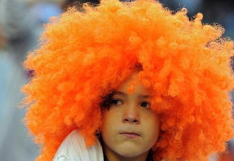 NEW YORK - SEPTEMBER 28:  A young fan looks on at the end of the game during the last regular season baseball game ever played in Shea Stadium featuring the New York Mets and the Florida Marlins on September 28, 2008 in the Flushing neighborhood of the Queens borough of New York City. The Florida Marlins defeated the New York Mets 4-2. The Mets plan to start next season at their new stadium Citi Field after playing in Shea for over 44 years.  (Photo by Al Bello/Getty Images)