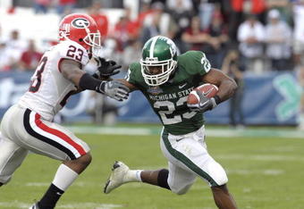 ORLANDO, FL - JANUARY 1: Running back Javon Ringer #23 of the Michigan State Spartans rushes upfield against the Georgia Bulldogs at the 2009 Capital One Bowl at the Citrus Bowl on January 1, 2009 in Orlando, Florida.  (Photo by Al Messerschmidt/Getty Images) 