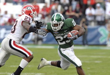 ORLANDO, FL - JANUARY 1: Running back Javon Ringer #23 of the Michigan State Spartans rushes upfield against the Georgia Bulldogs at the 2009 Capital One Bowl at the Citrus Bowl on January 1, 2009 in Orlando, Florida.  (Photo by Al Messerschmidt/Getty Images) 