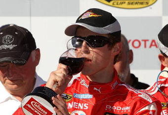 SONOMA, CA - JUNE 21: Kasey Kahne, driver of the #9 Budweiser Dodge, celebrates in victory lane after winning the NASCAR Sprint Cup Series Toyota/Save Mart 350 at the Infineon Raceway on June 21, 2009 in Sonoma, California.  (Photo by Ezra Shaw/Getty Images for NASCAR)