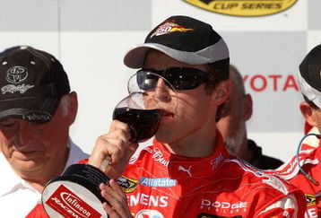 SONOMA, CA - JUNE 21: Kasey Kahne, driver of the #9 Budweiser Dodge, celebrates in victory lane after winning the NASCAR Sprint Cup Series Toyota/Save Mart 350 at the Infineon Raceway on June 21, 2009 in Sonoma, California.  (Photo by Ezra Shaw/Getty Images for NASCAR)