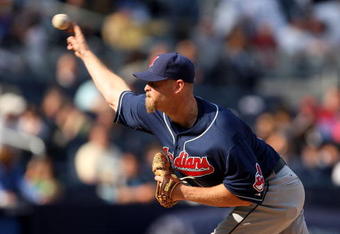 NEW YORK - APRIL 19:  Kerry Wood #34 of the Cleveland Indians pitches against the New York Yankees at Yankee Stadium on April 19, 2009 in the Bronx borough of New York City.  (Photo by Ezra Shaw/Getty Images)