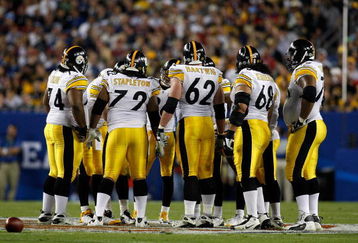 TAMPA, FL - FEBRUARY 01: Offensive linemen (L-R) Willie Colon #74, Darnell Stapleton #72, Justin Hartwig #62,  Chris Kemoeatu #68 and Max Starks #78 of the Pittsburgh Steelers stand in the huddle against the Arizona Cardinals during Super Bowl XLIII on February 1, 2009 at Raymond James Stadium in Tampa, Florida.  (Photo by Chris Graythen/Getty Images) Steelers won 27-23.