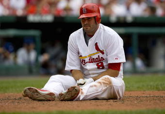 ST. LOUIS, MO - AUGUST 7: Troy Glaus #8 of the St. Louis Cardinals reacts to nearly being hit by a pitch against the Los Angeles Dodgers at Busch Stadium August 7, 2008 in St. Louis, Missouri. The Dodgers beat the Cardinals 4-1.  (Photo by Dilip Vishwanat/Getty Images)