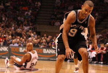 EAST RUTHERFORD, NJ - MARCH 02:  Richard Jefferson #24 of the New Jersey Nets looks on after Tony Parker #9 of the San Antonio Spurs steals the ball and scores during their game on March 2, 2008 at the Izod Arena in East Rutherford, New Jersey.  Photo By Al Bello/Getty Images.  NOTE TO USER: User expressly acknowledges and agrees that, by downloading and/or using this Photograph, user is consenting to the terms and conditions of the Getty Images License Agreement.  (Photo by Al Bello/Getty Images)