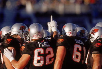 26 Nov 2000:  A general view of the British Columbia Lions team huddling up before the Grey Cup 2000 game against the Montreal Alouettes at the McMahon Stadium in Calgary, Alberta, Canada. The Lions defeated the Alouettes 28-26.Mandatory Credit: Craig Klem  /Allsport