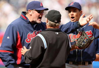 NEW YORK - APRIL 19:  Cleveland Indians manager Eric Wedge and Grady Sizemore #24 argue with the umpire about a pinch hit two-run home run by Jorge Posada of the New York Yankees in the seventh inning of their game against the Cleveland Indians at Yankee Stadium on April 19, 2009 in the Bronx borough of New York City.  The hit was reviewed by instant replay, and was ruled a home run.  (Photo by Ezra Shaw/Getty Images)
