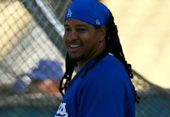 LOS ANGELES, CA - MAY 05:  Manny Ramirez #99 of the Los Angeles Dodgers smiles during batting practice prior to the game against the Arizona Diamondbacks at Dodger Stadium on May 5, 2009 in Los Angeles, California.  (Photo by Jeff Gross/Getty Images)