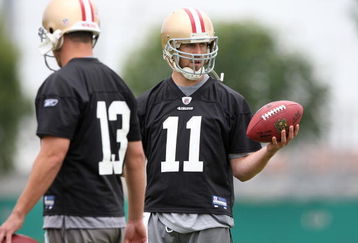 SANTA CLARA, CA - MAY 01:  Quarterbacks Alex Smith #11 and Shaun Hill #13 of the San Francisco 49ers look on during the 49ers Minicamp at their training facilities on May 1, 2009 in Santa Clara, California.  (Photo by Jed Jacobsohn/Getty Images)