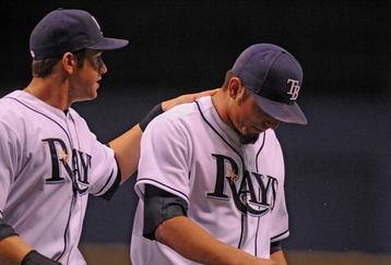 ST. PETERSBURG, FL - APRIL 30: Infielder Evan Longoria #3 talks with pitcher Matt Garza  #22 of the Tampa Bay Rays against the Boston Red Sox April 30, 2009 at Tropicana Field in St. Petersburg, Florida.  (Photo by Al Messerschmidt/Getty Images)