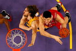 LOS ANGELES, CA - MAY 06:  Yao Ming #11 of the Houston Rockets goes up for a shot over Pau Gasol #16 of the Los Angeles Lakers in Game Two of the Western Conference Semifinals during the 2009 NBA Playoffs against the Los Angeles Lakers at Staples Center on May 6, 2009 in Los Angeles, California. The Lakers defeated the Rockets 111-98. NOTE TO USER: User expressly acknowledges and agrees that, by downloading and or using this photograph, User is consenting to the terms and conditions of the Getty Images License Agreement.  (Photo by Harry How/Getty Images)