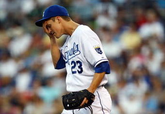 KANSAS CITY, MO - JUNE 17:  Starting pitcher Zack Greinke #23 of the Kansas City Royals reacts after giving up three runs during the 4th inning of the game against the Arizona Diamondbacks on June 17, 2009 at Kauffman Stadium in Kansas City, Missouri.  (Photo by Jamie Squire/Getty Images)