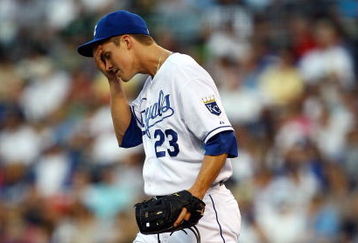 KANSAS CITY, MO - JUNE 17:  Starting pitcher Zack Greinke #23 of the Kansas City Royals reacts after giving up three runs during the 4th inning of the game against the Arizona Diamondbacks on June 17, 2009 at Kauffman Stadium in Kansas City, Missouri.  (Photo by Jamie Squire/Getty Images)