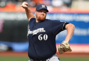 NEW YORK - APRIL 19:  Todd Coffey #60 of the Milwaukee Brewers pitches against the New York Mets at Citi Field on April 19, 2009 in the Flushing neighborhood of the Queens borough of New York City.  (Photo by Nick Laham/Getty Images)